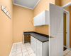 This bonus area in the laundry room could be the perfect place for crafting or any hobbies.