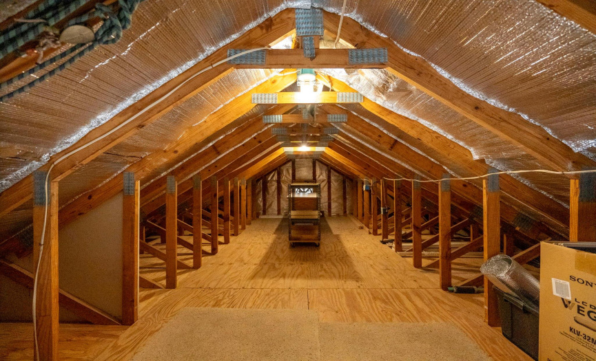 The attic area has added insulation and flooring for your additional storage needs.