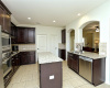 Nice kitchen with center island, stainless steel appliances and granite counertops