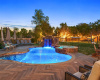With custom lighting throughout the backyard, this is the perfect getaway!