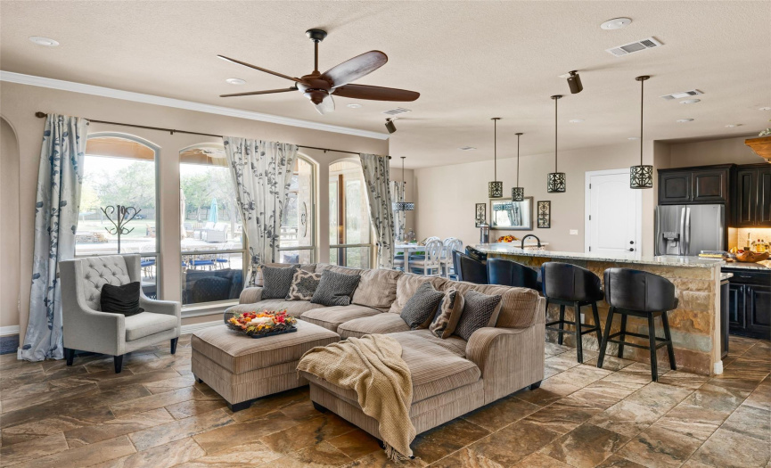 With 10 foot ceilings, the open living area feels bright and inviting.