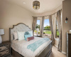 A secondary suite is situated on the main level with wonderful light and views from the front of the home.