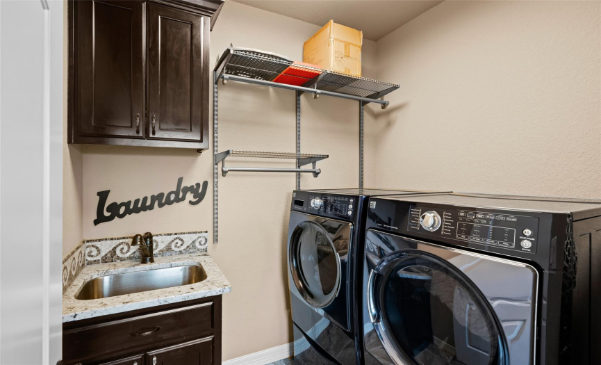 The upstairs laundry room - one on each level!