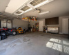 Garage with storage.  Water softener and door to the back yard. 