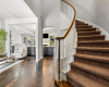 As you enter the home you are greeted by the great staircase and open floorplan