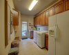 Great natural light and space in this laundry room located off the kitchen