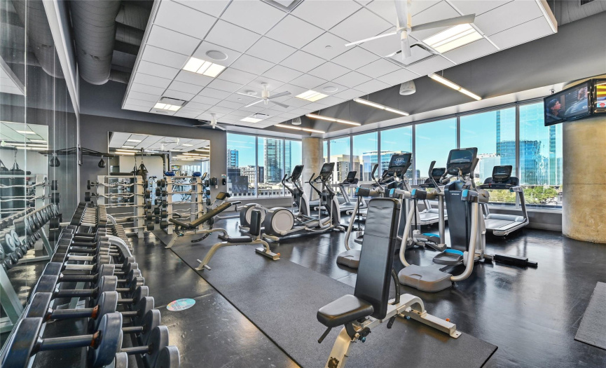 Fully equipped gym with gorgeous, city views. 