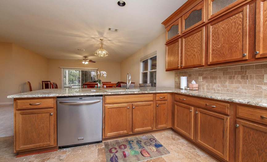 4- The convenient Cook's Kitchen includes the bar and ample area for serving the family with ease.