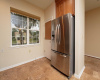 6- The pantry and stainless Refrigerator are convenient for the cook.
