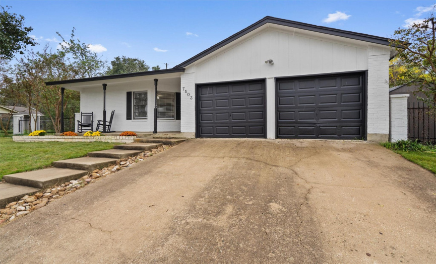 This home also provides a two car garage with the laundry hookups, custom built-in storage shelving, and excellent workshop potential. Fresh paint inside & out and the roof is only 4 years old! 