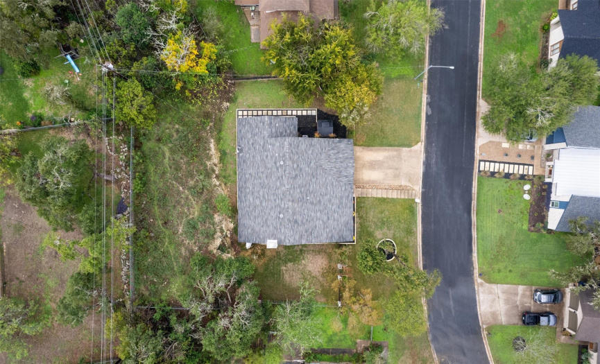 This large 0.3152 Acre property continues past the rock outcrop in the backyard with plenty of additional yard for your ideal use of space. 