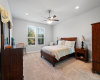 Retreat to the main floor primary bedroom, a haven of privacy and tranquility.