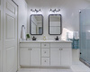  The en-suite bathroom offers double vanity