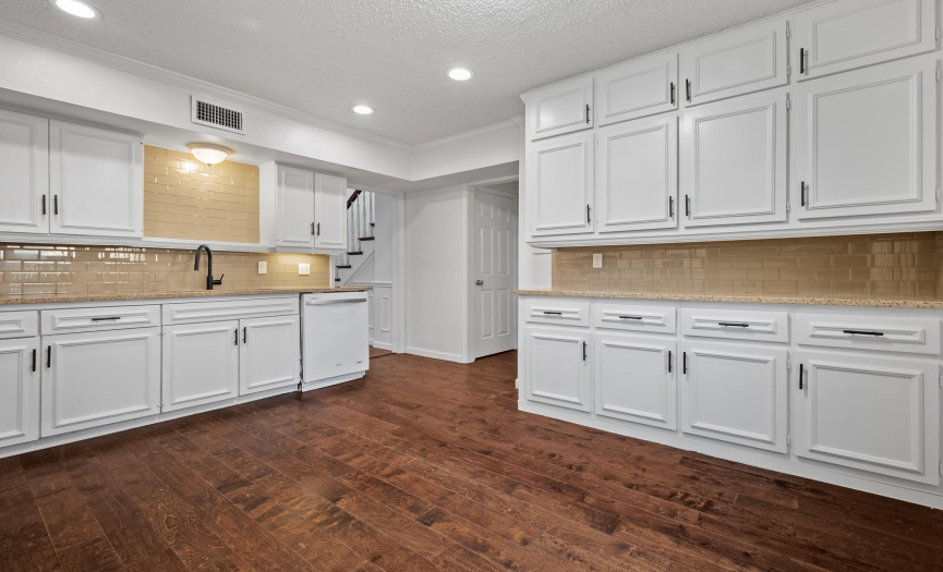 The home chef will be delighted by all the counter space and cabinetry storage in the spacious kitchen.