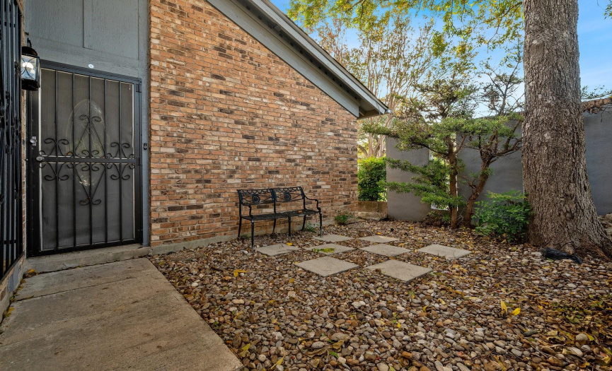 Enjoy your own private front courtyard with sustainable xeriscape and lush greenery. 
