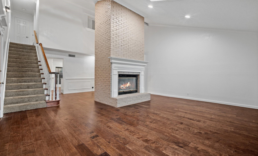 Gorgeous engineered hardwoods run throughout the condo with designer tile in the bathrooms and carpet exclusively on the stairs. 
