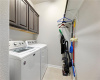Laundry room.  Washer and Dryer are included.  Nice cabinets and hanging bar for your clothes.