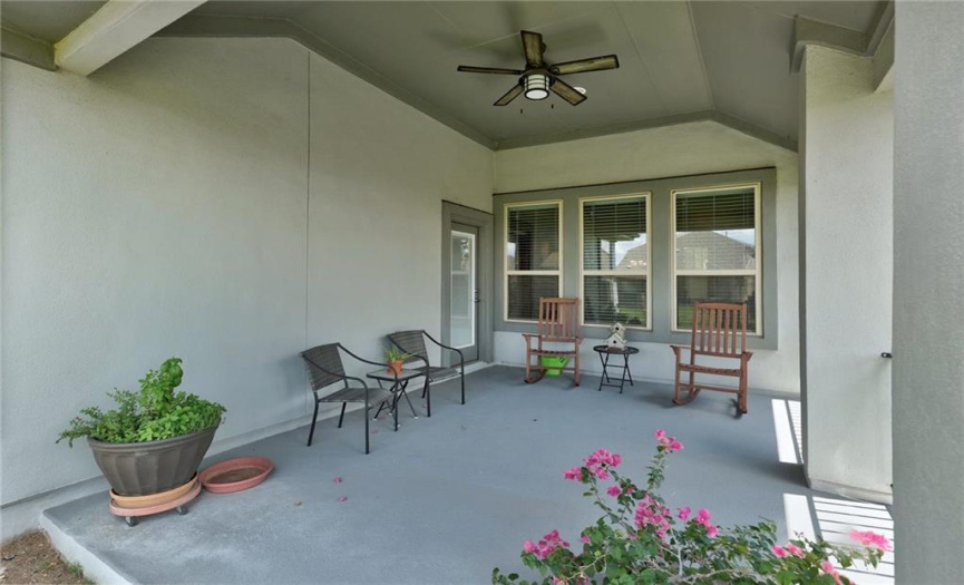 Covered patio.  Plenty of space for a BBQ and patio table.  Great spot to entertain friends, family and neighbors.