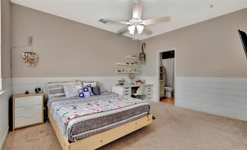 Three large secondary bedrooms (this one has shiplap board trim).