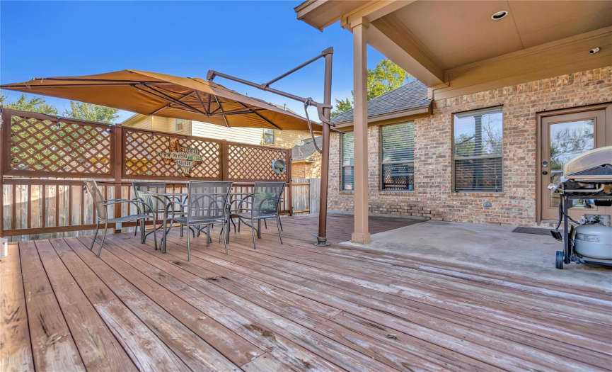 Big backyard, deck and space to romp and play. (Come see the new stained deck!)