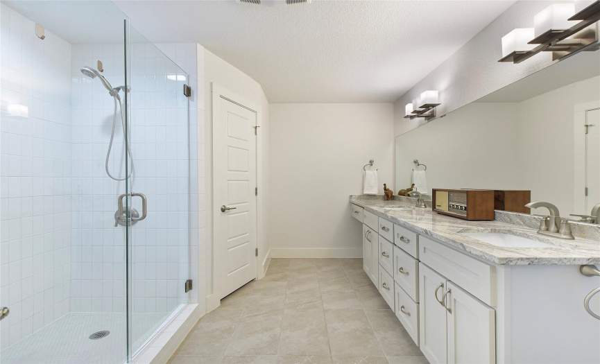 Master bath offers granite counter top double vanity, walk in shower and 2 closets.