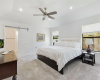 Beautiful master bedroom with vaulted ceiling, recessed lighting and ceiling fan.