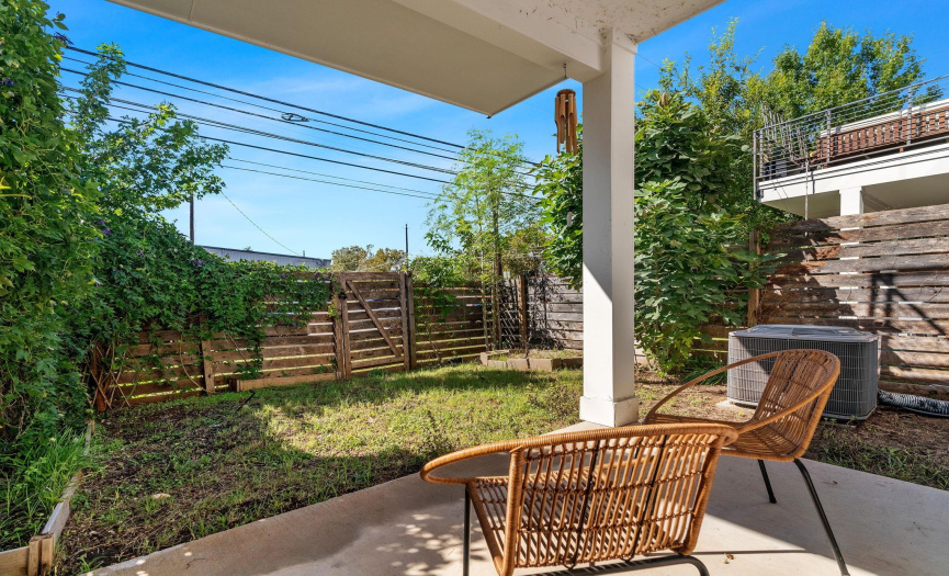 A glass door off the guest suite opens onto the patio, situated under the cover of the 2nd floor balcony, plus your own private fenced-in yard with gated access. 