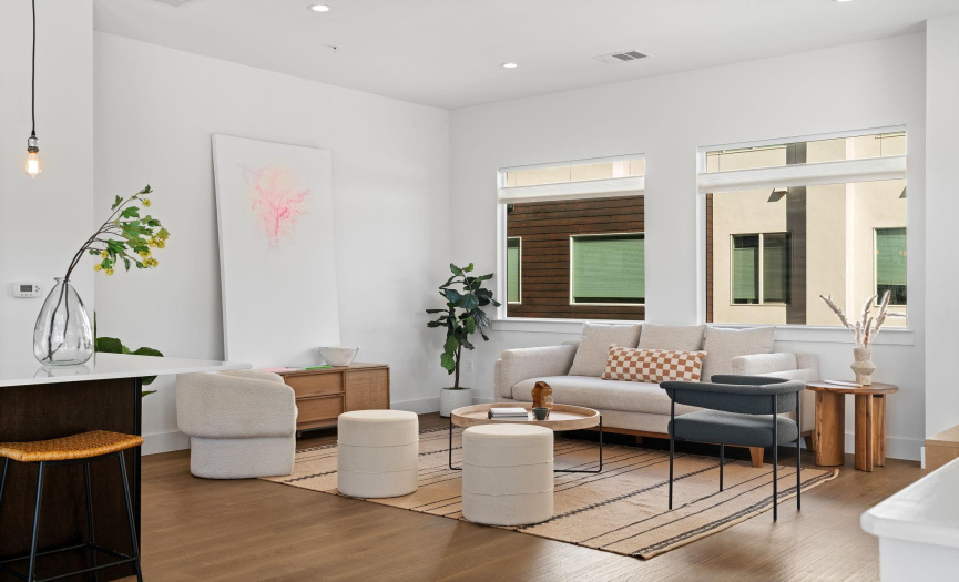 The bright and open floor plan makes it easy to stay connected with friends and family throughout the main living area.