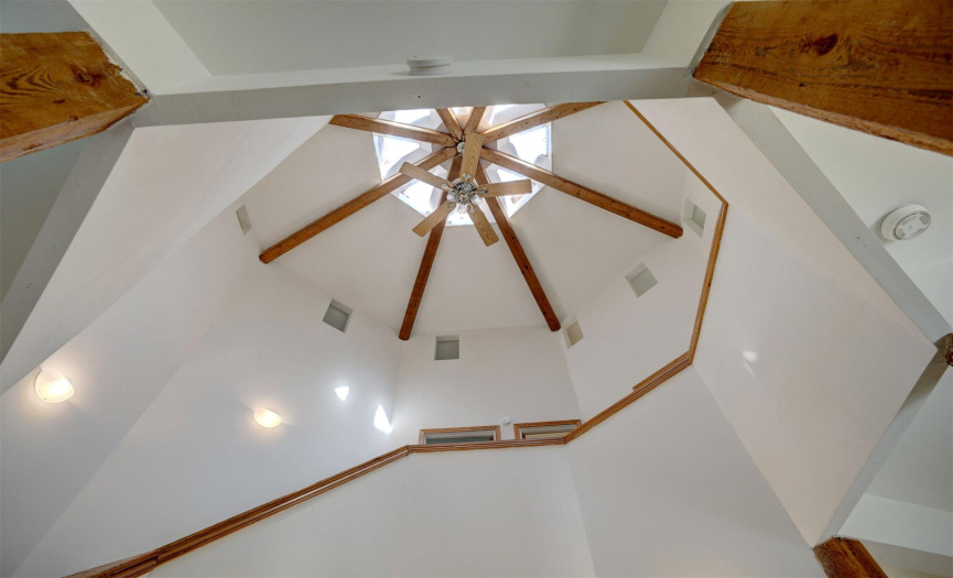 Gorgeous octagonal beam and sky light ceiling.  