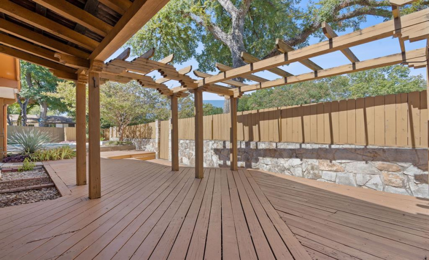 This home offers multiple outdoor sitting areas that beckon you to embrace the natural beauty surrounding you. 
