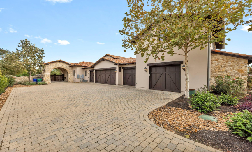 4 CAR OVERSIZED GARAGE WITH 5TH BAY FOR GOLF CART