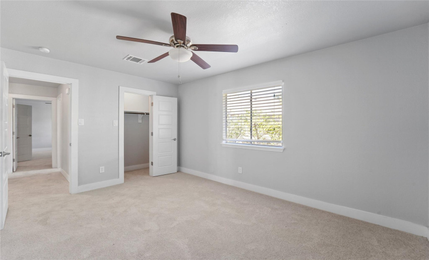 All of the bedrooms offer ceiling fans and their won walk-in closets. 