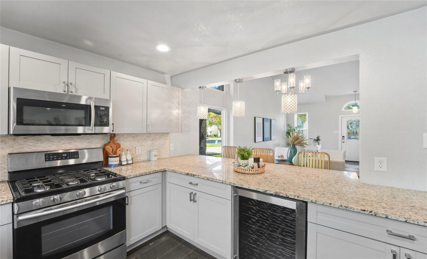 The gorgeous updated kitchen is sure to impress the home chef! 
