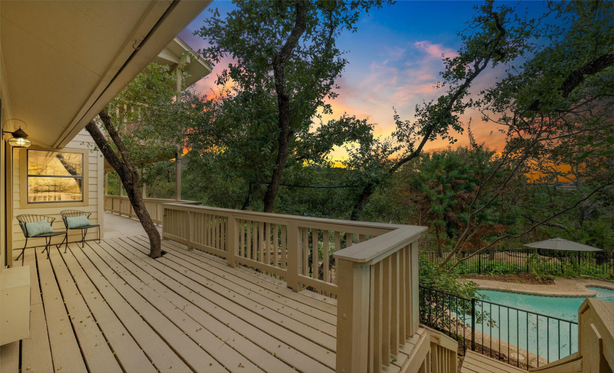 Views from every direction with sunsets that take your breath away. Porches on top and bottom.  Primary down with patio doors onto the porch and deck area.