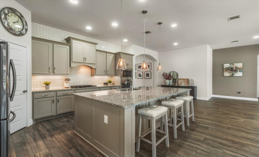 Walk-in Pantry and plenty of lighting make this Kitchen a dream. 