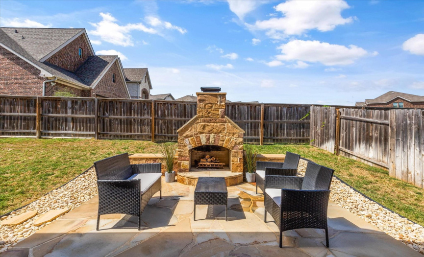 The upgrades of this home even extend outside with the fireplace! Enjoy cool evenings with friends and family! 