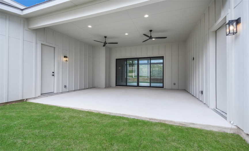 Large covered patio, plenty of room for outdoor dining and grilling.