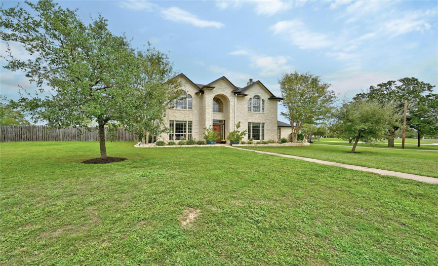 Nestled within the serene beauty of Ruby Ranch's natural surroundings, this expansive 2.85-acre property offers a tranquil escape, close to Austin's vibrant city life.