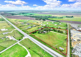 Approx. borders - view of front of property with 538' of frontage road on Hwy 142