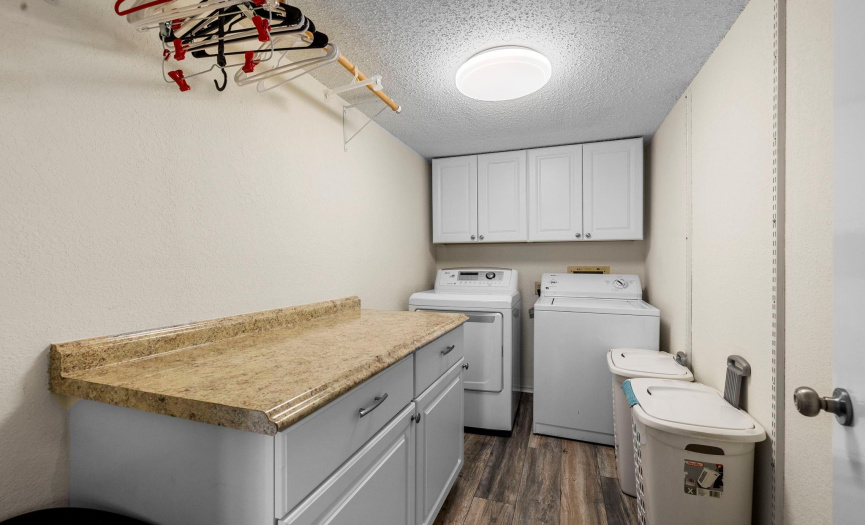 Laundry room located in the home off the kitchen.
