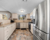 Completely remodeled kitchen including slow closing cabinets and drawers, stainless appliances and granite countertops.