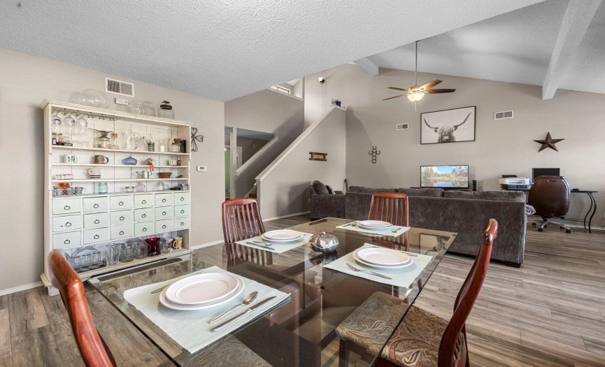 Vaulted ceiling in the living room makes for a spacious area for the gathering of family and friends.
