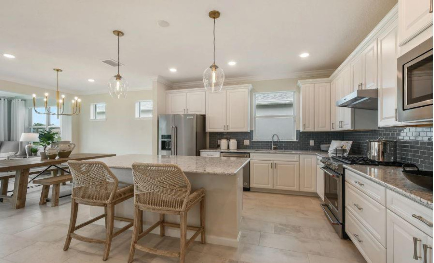 Photo of Pulte model home with same floor  plan, not of actual home listed.