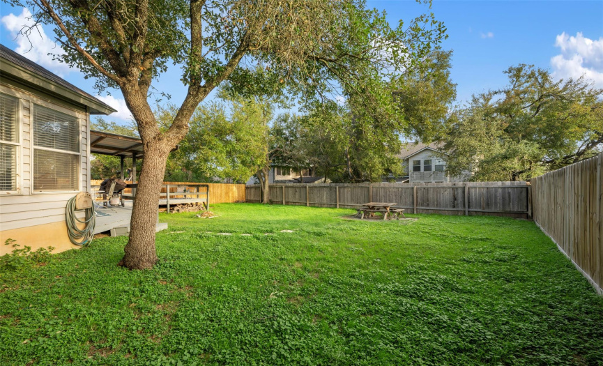 Additional view of the backyard. Plenty of room for your vegetable garden or personalized dog park. 