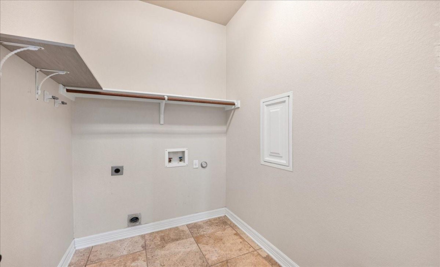 Laundry Room with shelving.