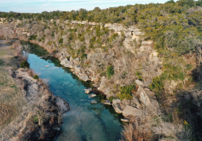 Perched atop a bluff overlooking Barton Creek