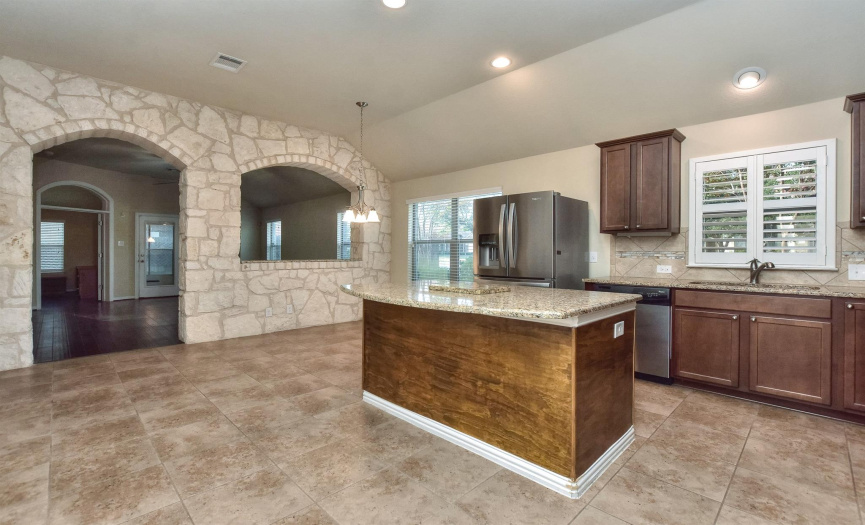 Open Kitchen with large island and breakfast area. 
