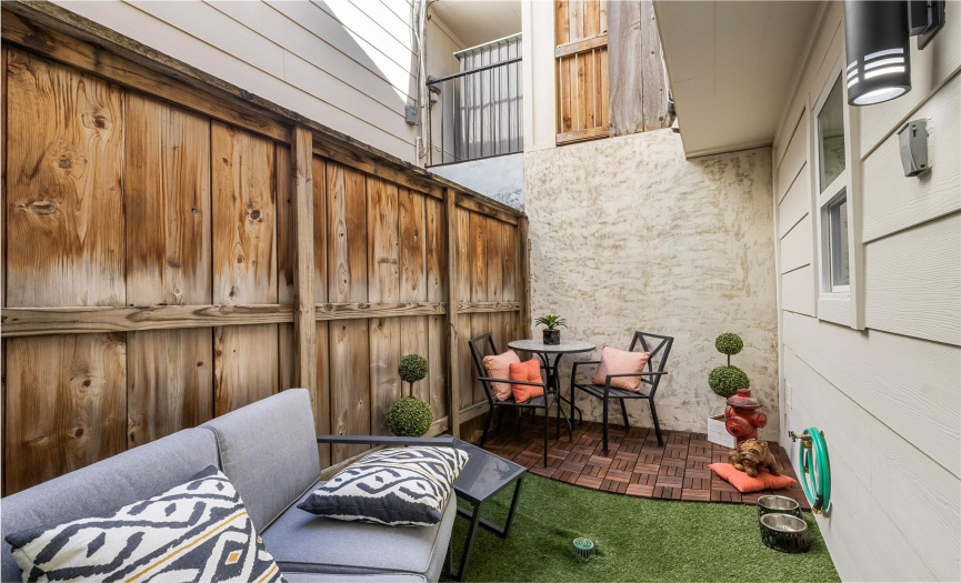 Private patio. room for a large puppy play area. or cat retreat. Or keep it for you and your cozy patio furniture. French drain makes clean up easy.