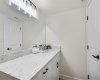 Fully remodeled downstairs half bath. Granite. Lights, cabinets, commode, doors, trim.