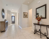 Inviting foyer leads you to the open living room and kitchen.